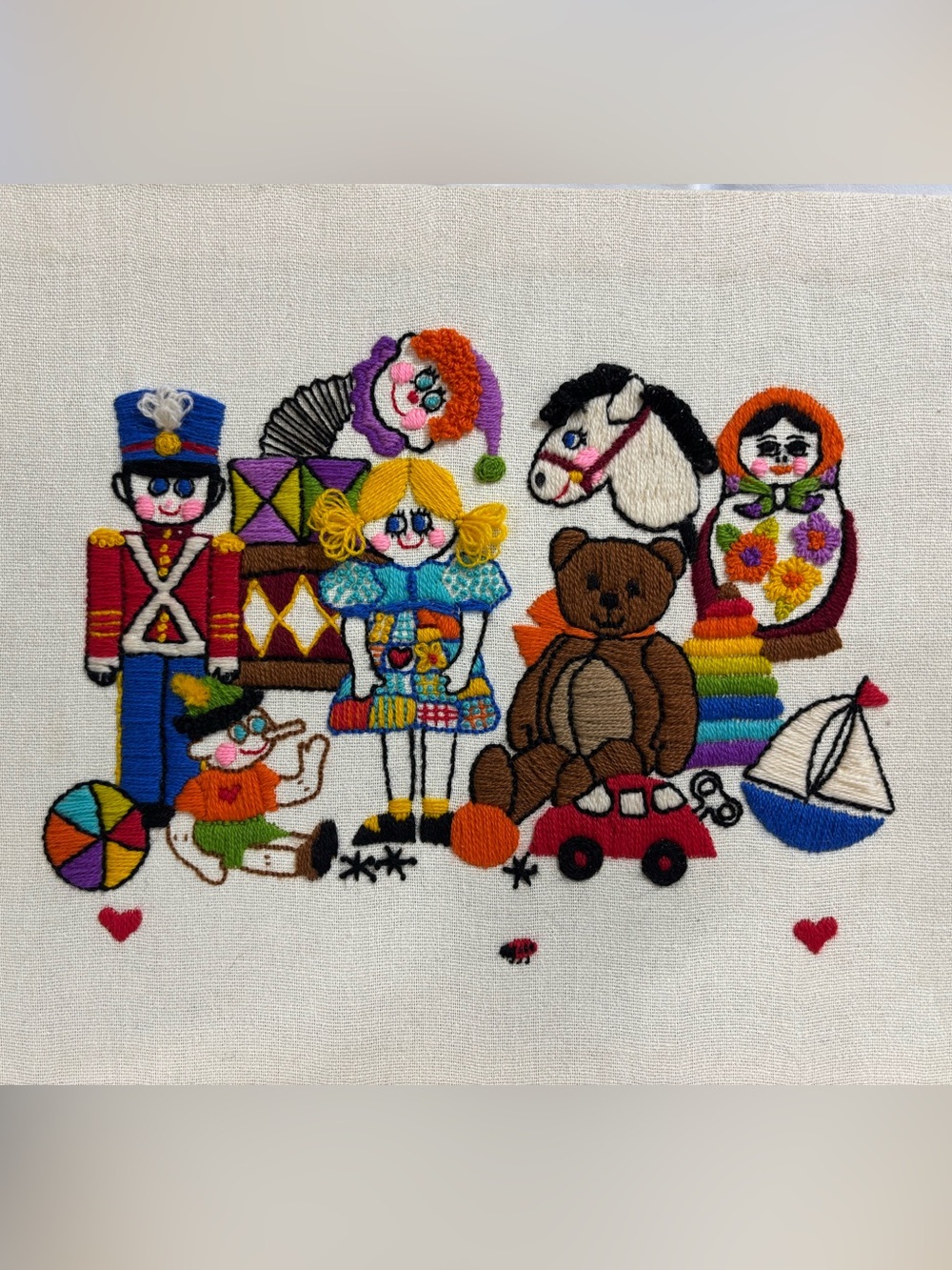Vintage embroidery piece on canvas and wood frame